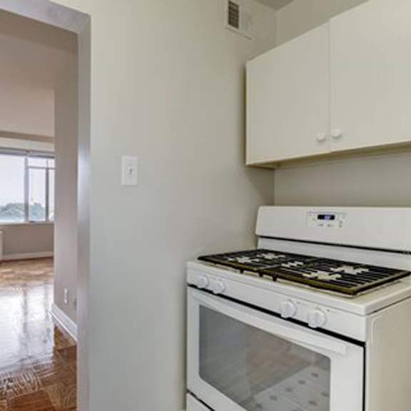 white stove in a kitchen at monticello at southern towers, alexandria