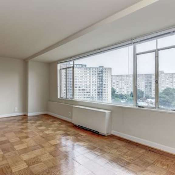 living room with oversized windows at monticello at southern towers, alexandria, va, 22311