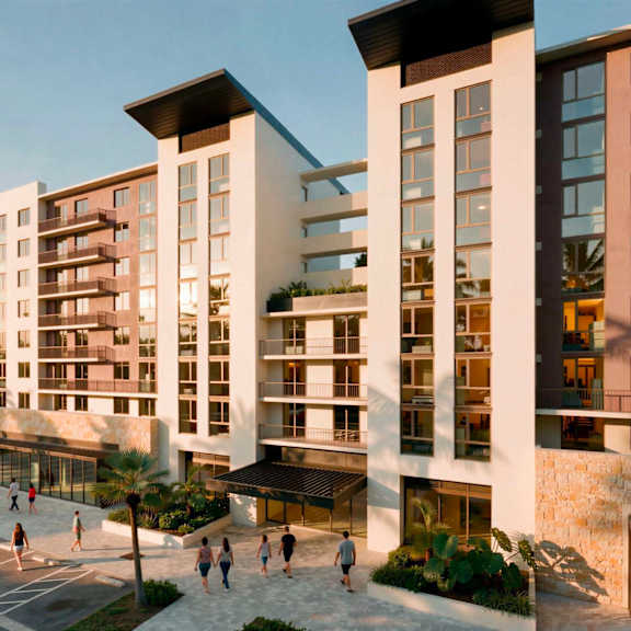 a modern building with a lot of windows and balconies.