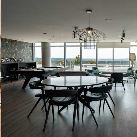 modern dining room with round table and seating at baseline apartments, ottawa, ontario