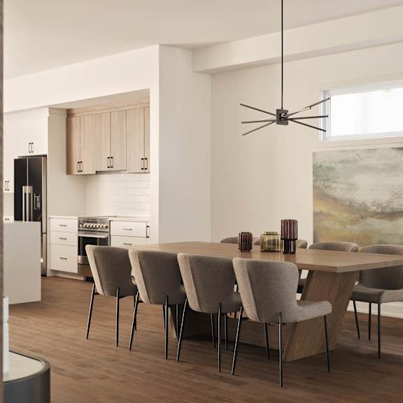 a modern dining room with a large table and chairs.