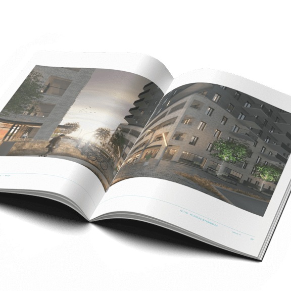 a book is open to a page with images of buildings and trees.