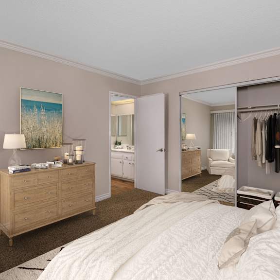 a bedroom with a large bed and a dresser with a lamp on it.