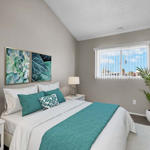 a bedroom with a large bed and a painting on the wall.