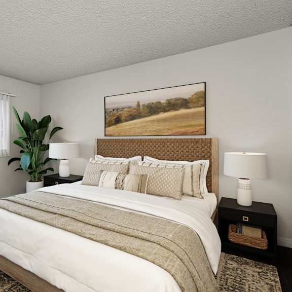 a bedroom with a large bed and a painting on the wall.
