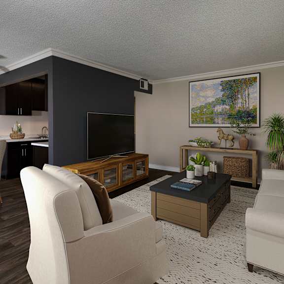 a living room with a white couch, a wooden coffee table, and a painting on the wall.