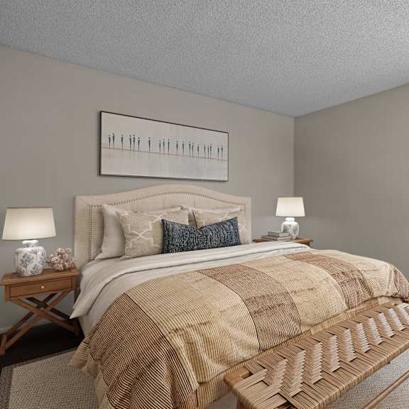 a bedroom with a bed, nightstands, and a bench.
