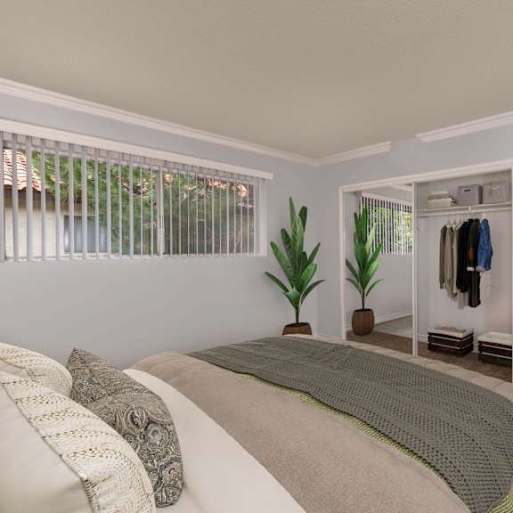 a bedroom with a bed, pillows, a window, a coat rack, and a plant.