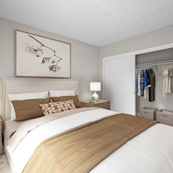 a bedroom with a large bed and a wooden headboard.