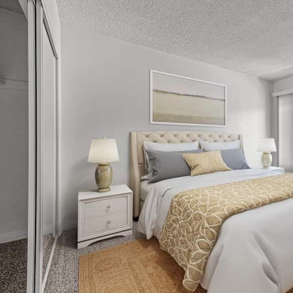a bedroom with a large bed and a painting above it.