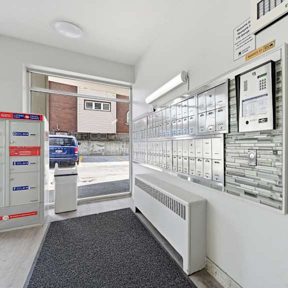 a control panel room with a grey carpet on the floor.