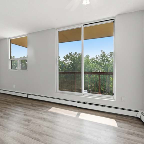 a room with a window and a sliding door.