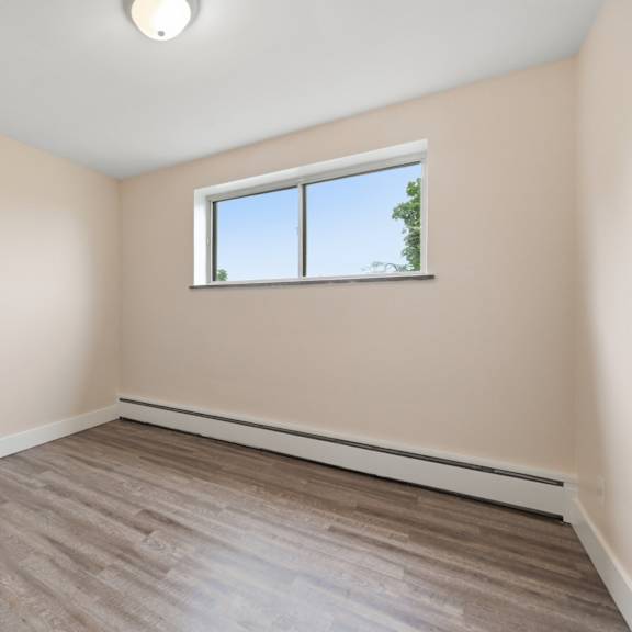 a room with a window and a door.