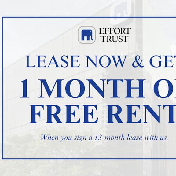 a sign advertising a free month of rent for signing a 13-month lease.