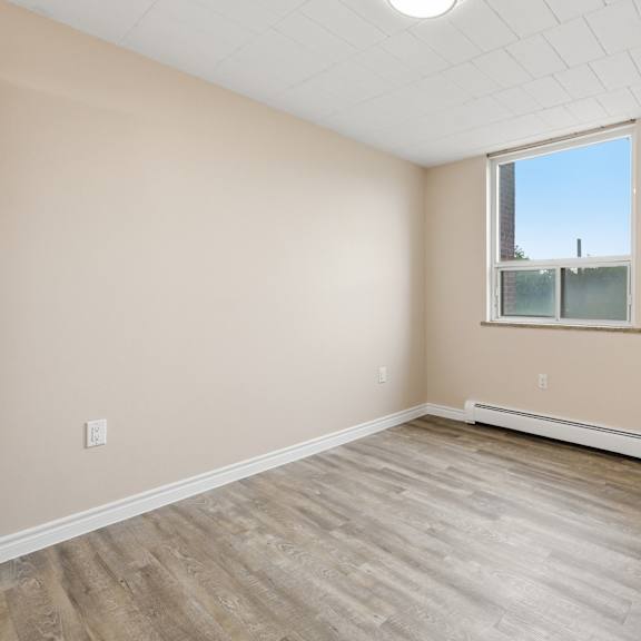 a room with a window and a door.