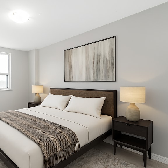 a bedroom with a large bed and a painting on the wall.