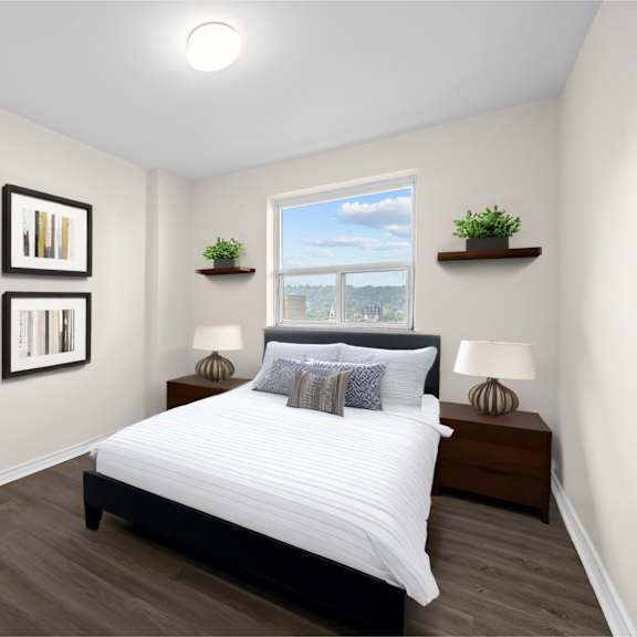 a bedroom with a large bed and a window with a view of the city.