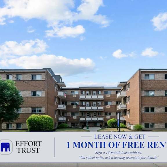 a sign advertises a free month of rent for leasing a 13-month lease with effort trust.