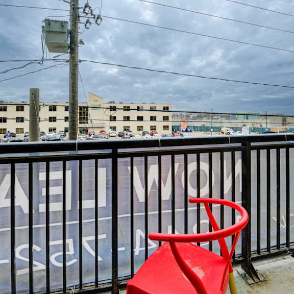balcony with chair at the maverick apartments, kitchener, on, n2h 0e3