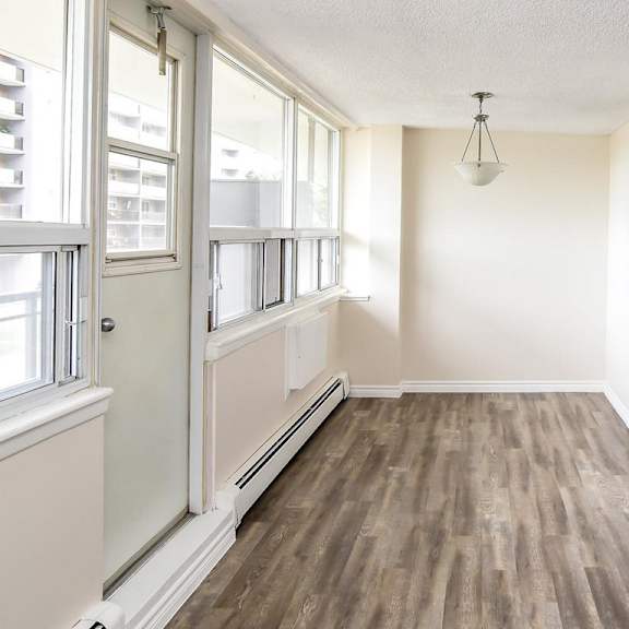 a room with a window and a door.