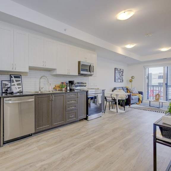 kitchen with wooden flooring at the maverick apartments, kitchener, on, n2h 0e3