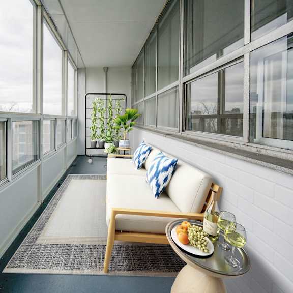 a table with food and drinks on it in front of a window.