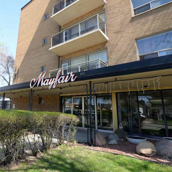 the exterior of a building with the name "mayfair" on it.