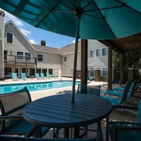 poolside dining area at latitude at riverchase, hoover