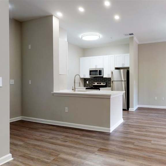 a kitchen with a countertop  at vue at embry hills, georgia