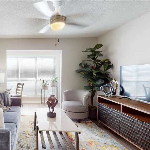 living room with ceiling fan at breckinridge vue, duluth, georgia