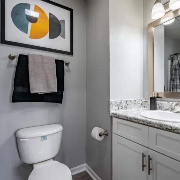 bathroom with vanity lights at spalding vue, georgia