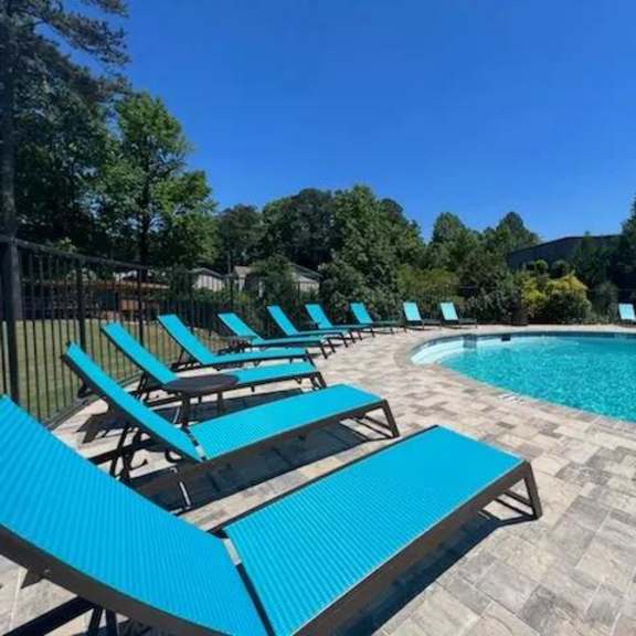 pool with sundecks at spalding vue, peachtree corners, ga, 30092