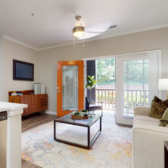 a modern kitchen with a stainless steel dishwasher and a glass coffee table at embry hills, atlanta, 30042