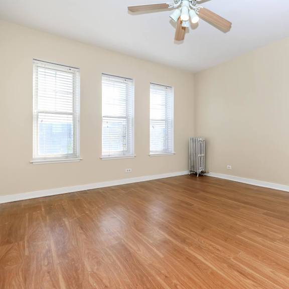 a room with wooden floors at sheridan park, illinois 60640