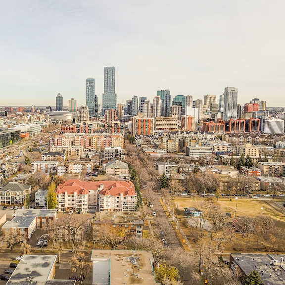 a cityscape with a mix of residential and commercial buildings.