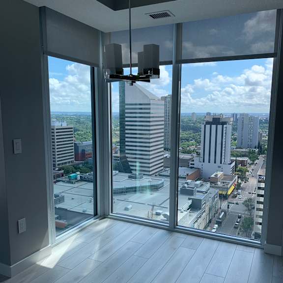 a view from the top of a building looking down at a cityscape.