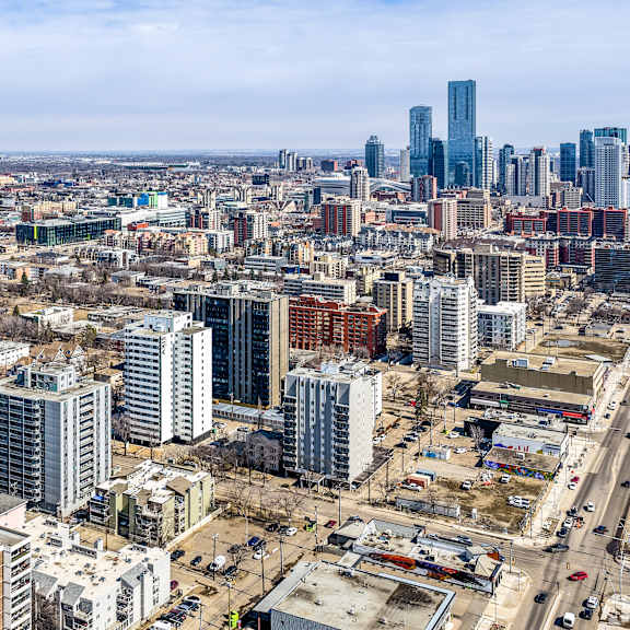 a cityscape with a mix of residential and commercial buildings.