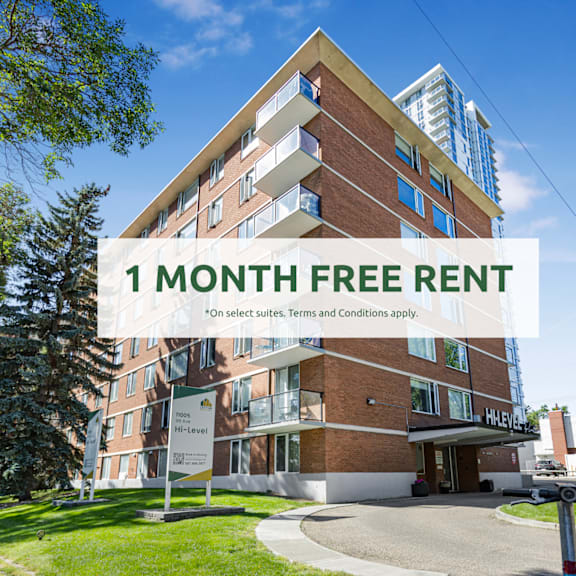 a building with a sign that says "1 month free rent" in front of it.