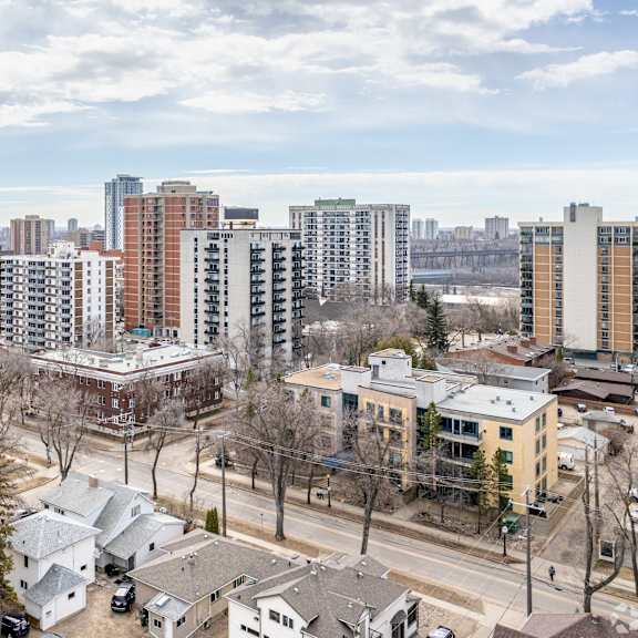 a cityscape with a mix of residential and commercial buildings.