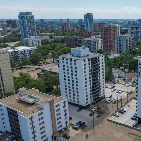 a cityscape with a mix of residential and commercial buildings.