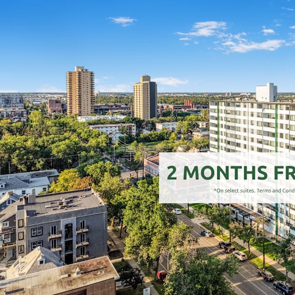 a cityscape with a building offering 2 months free rent.