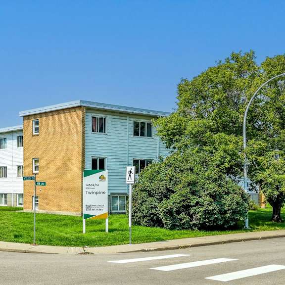a street view of a building with a sign that says "fringe".