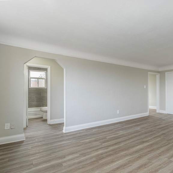 a room with a window and a door.