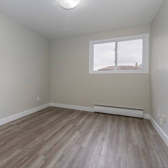 a room with a window and a door.
