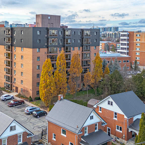 a view of a residential area with houses and apartment buildings.