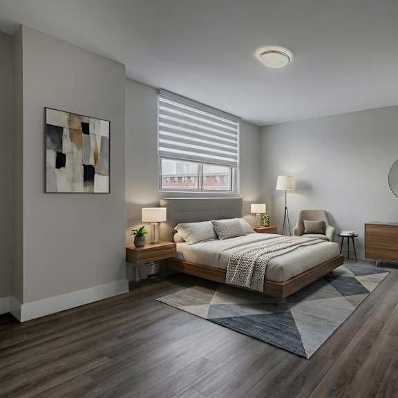 a bedroom with a bed, nightstands, and a painting on the wall.
