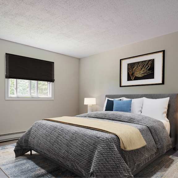 a bedroom with a large bed and a painting on the wall.