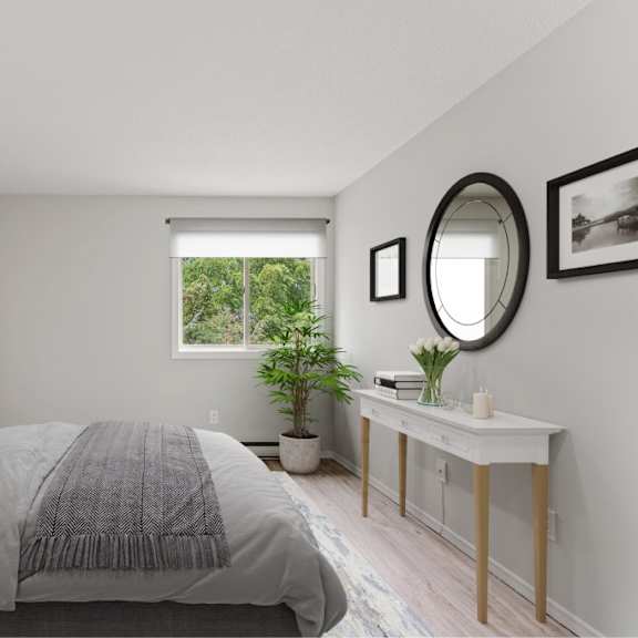 a bedroom with a large bed and a mirror on the wall.