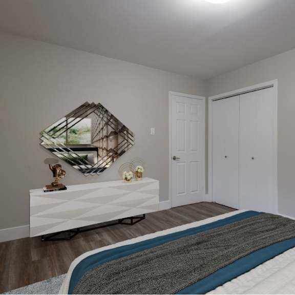 a bedroom with a bed, a mirror, and a painting on the wall.