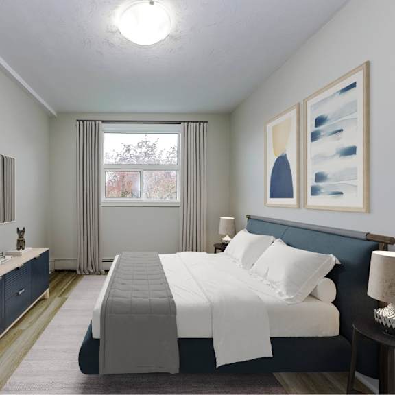 a bedroom with a bed, nightstand, and a plant on the side table.